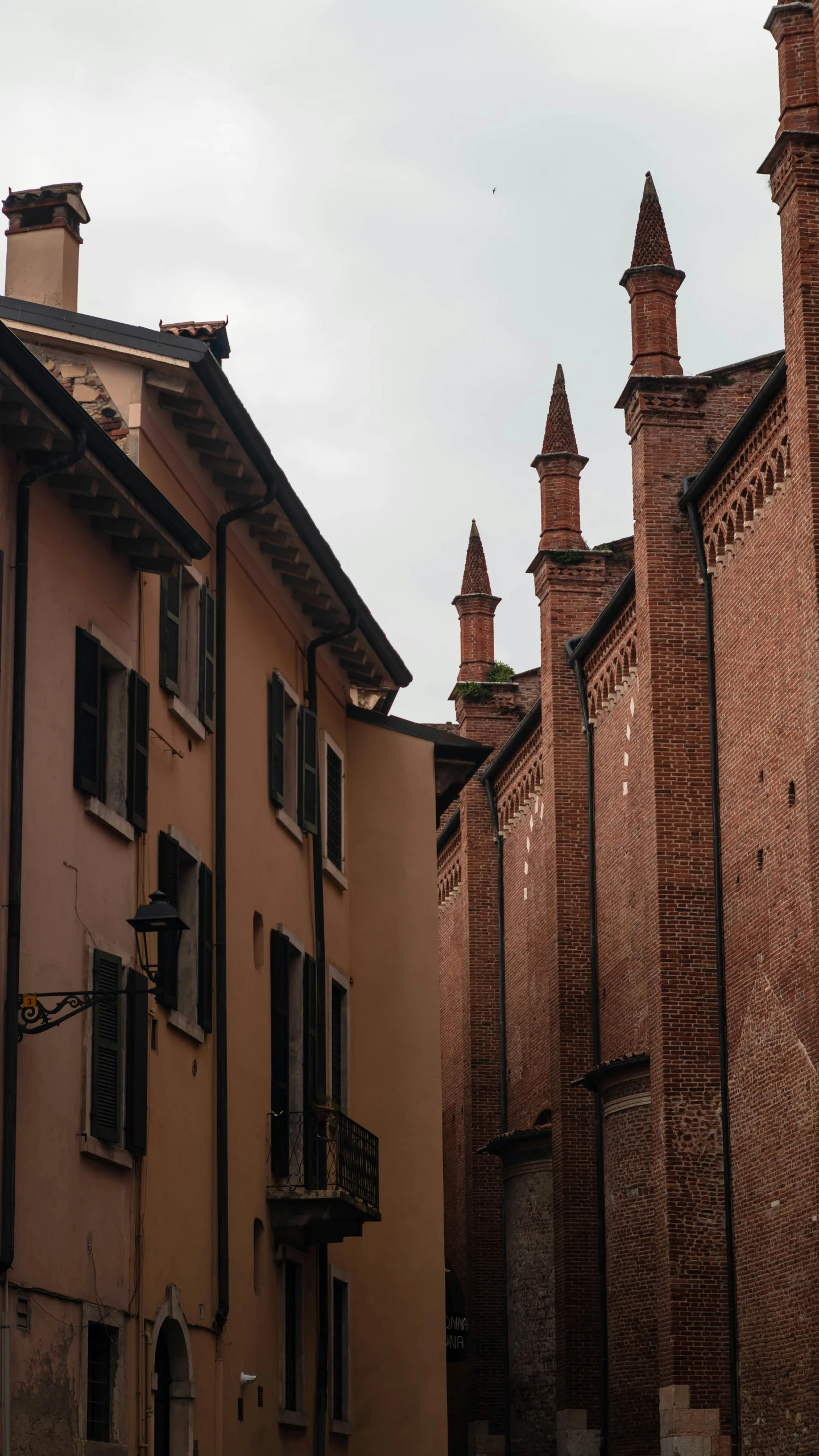 an old building with turrets on each side