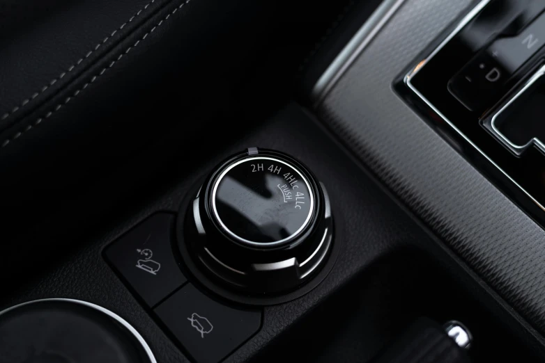 a black and silver dash on and the climate selector