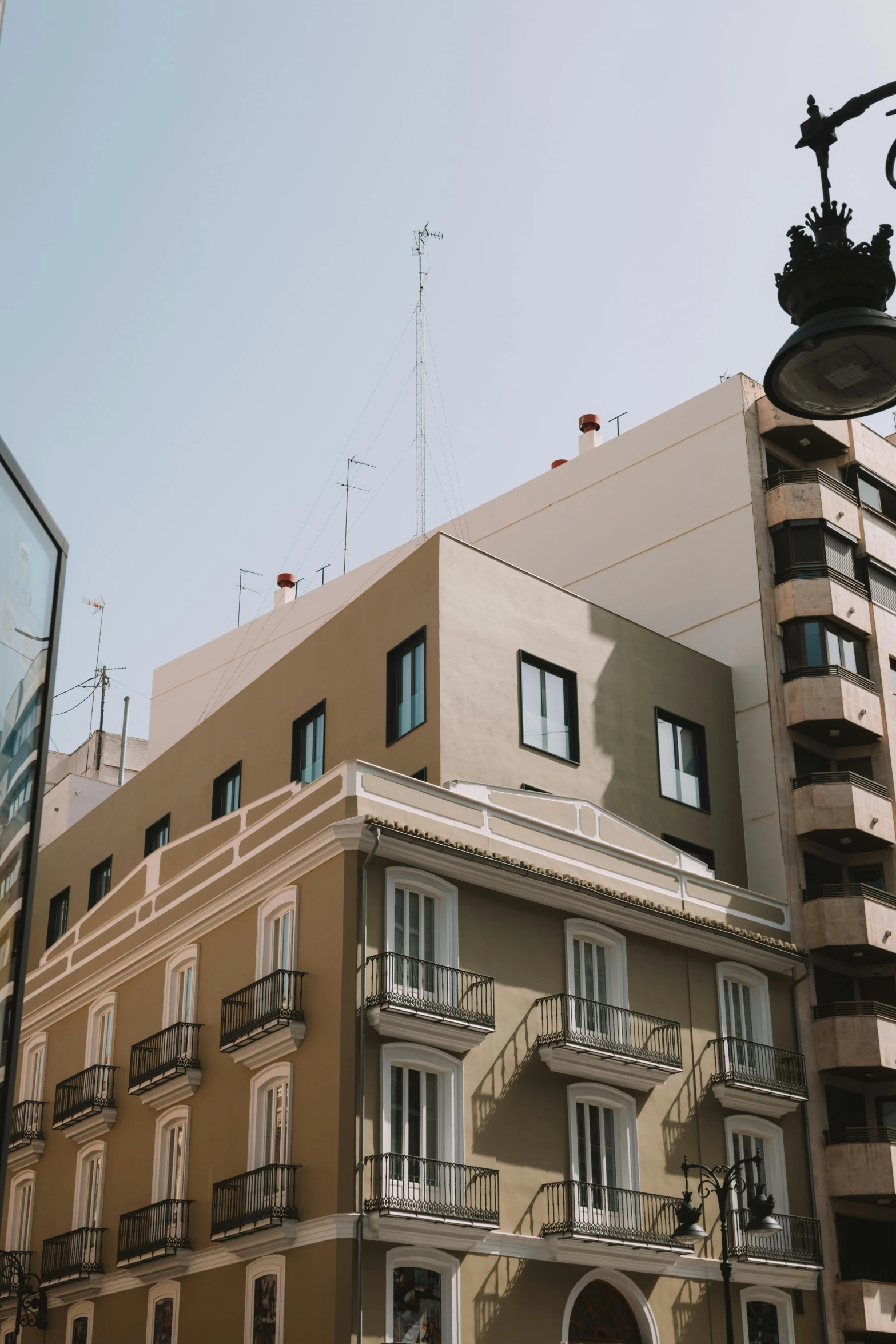 a tall building next to another tall building