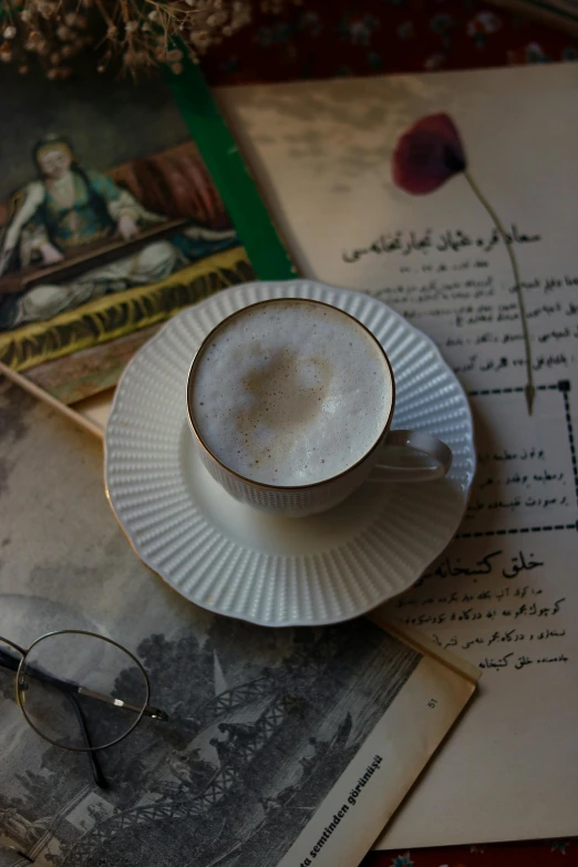 a cup of coffee on top of a saucer