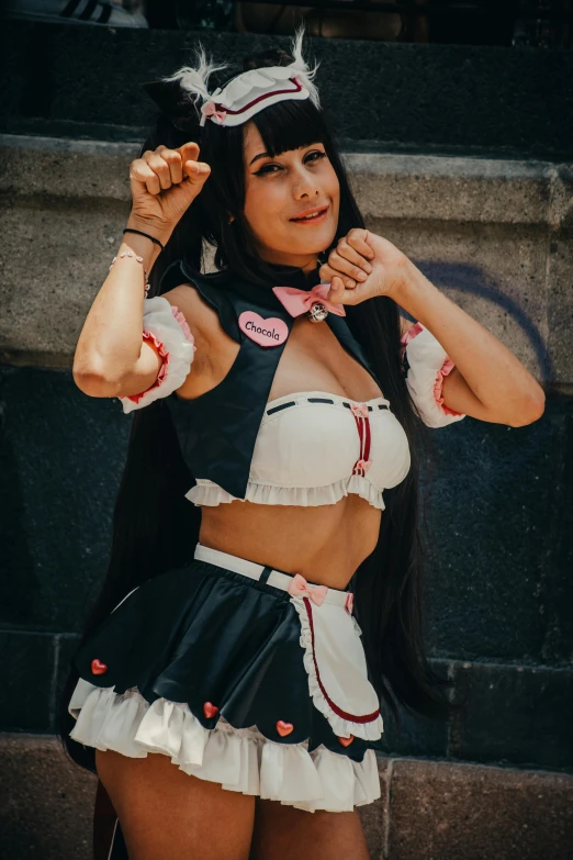 an image of a woman in costume holding her hair