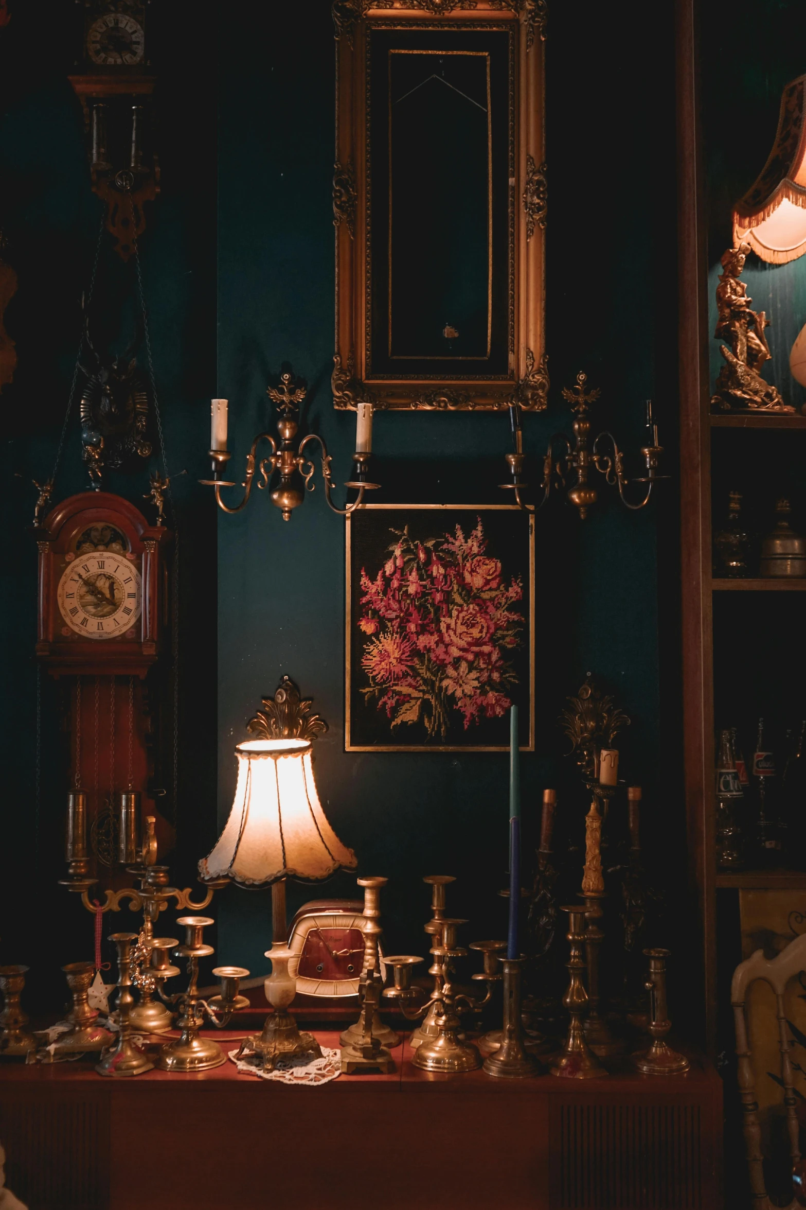 a room full of vases, lamp and some decorations