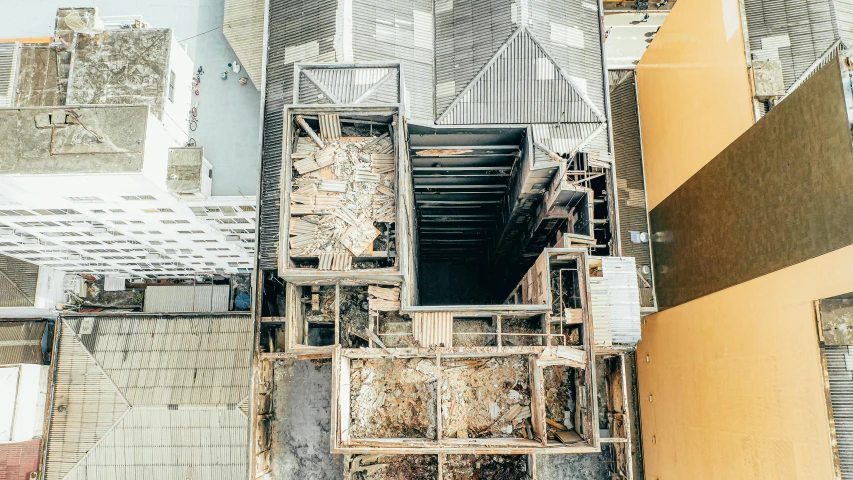 a bird's - eye view of a metal structure in the middle of a city