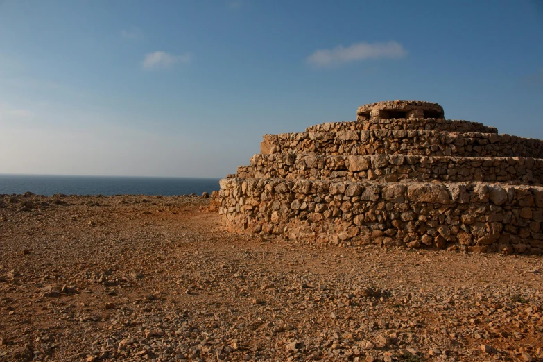 some kind of stone structure sitting on the ground