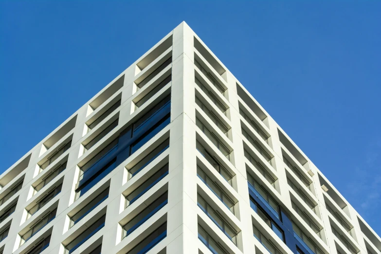 the side of a white building looking upward