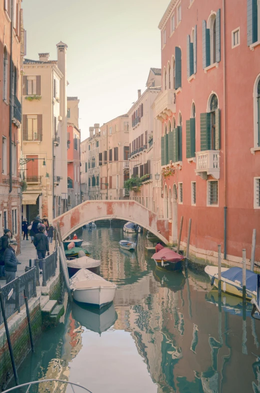 a narrow canal surrounded by many buildings