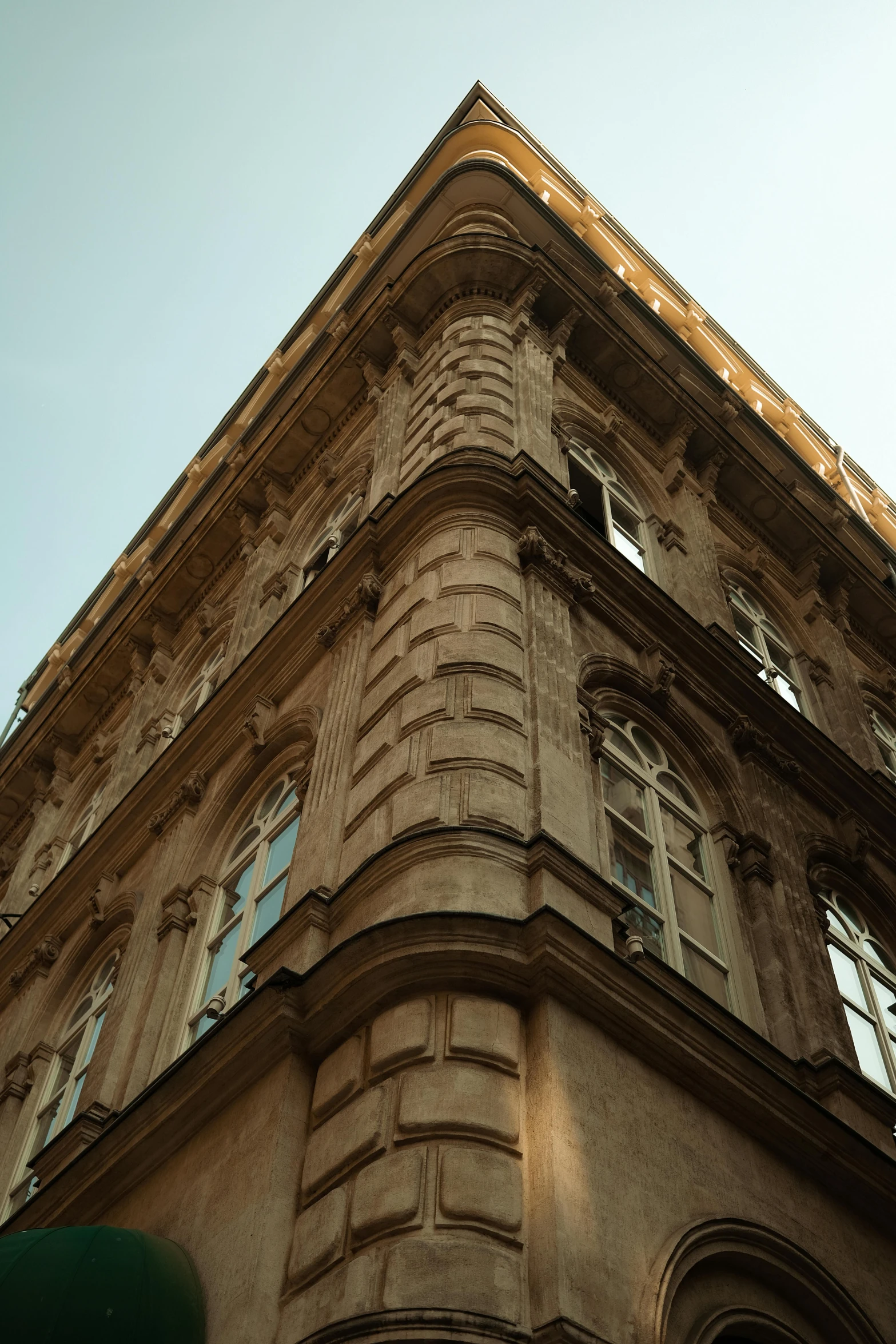 the side of a large building with some windows