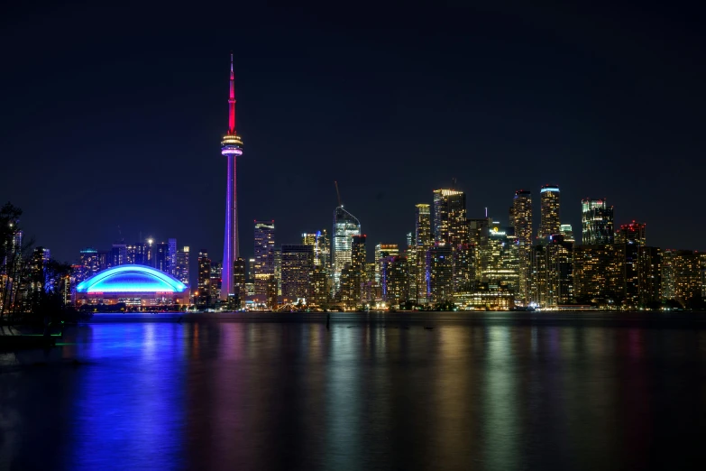 a nighttime view of the toronto skyline