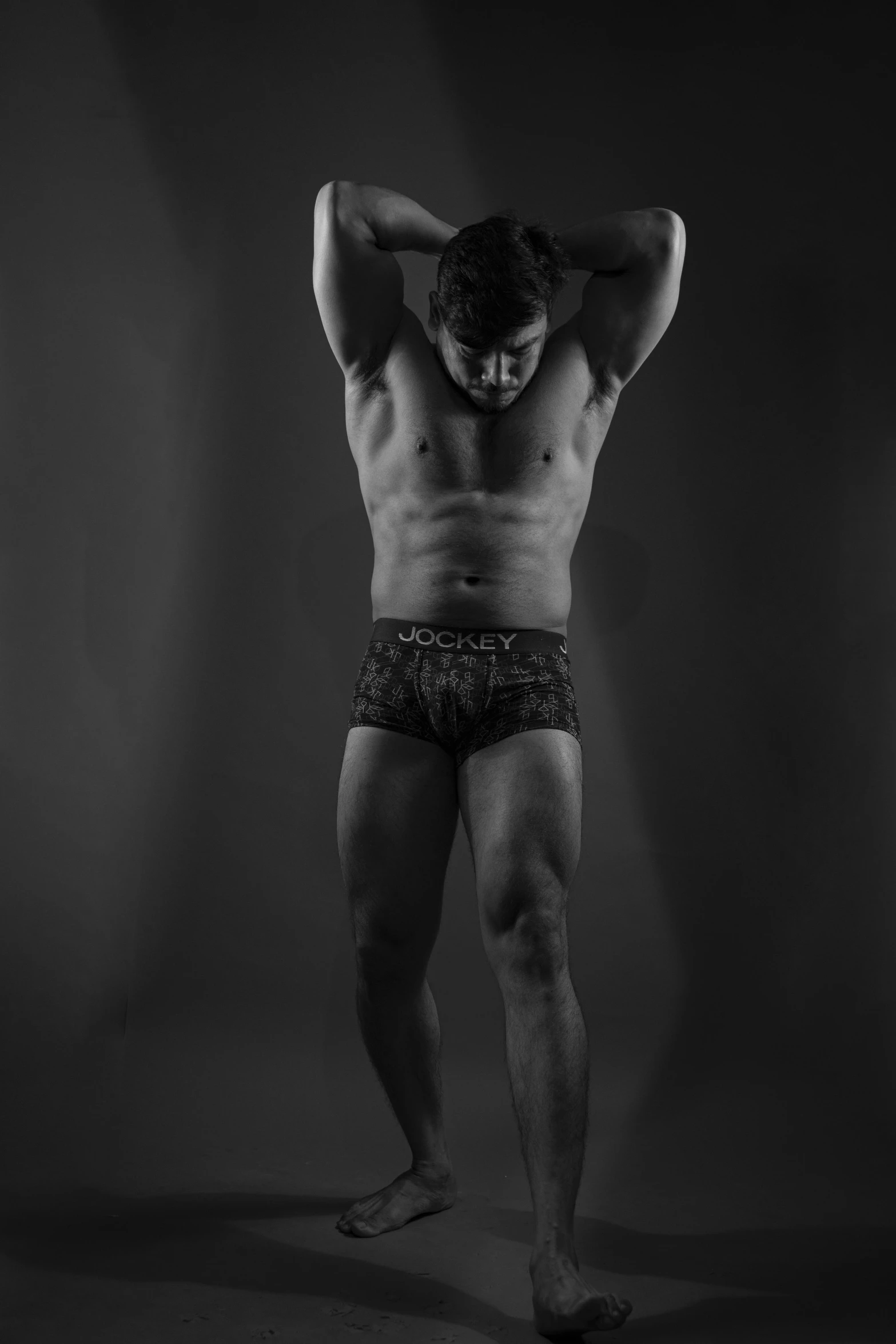 black and white image of man in underwear