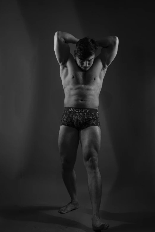 black and white image of man in underwear
