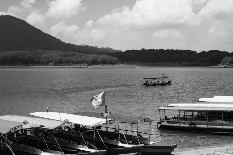 a harbor with many boats and boats floating on the water