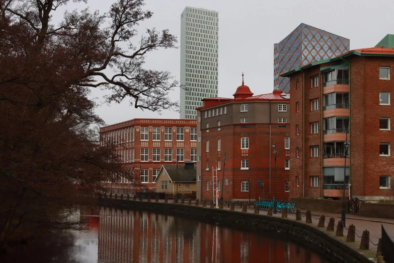 two building along the river near another building