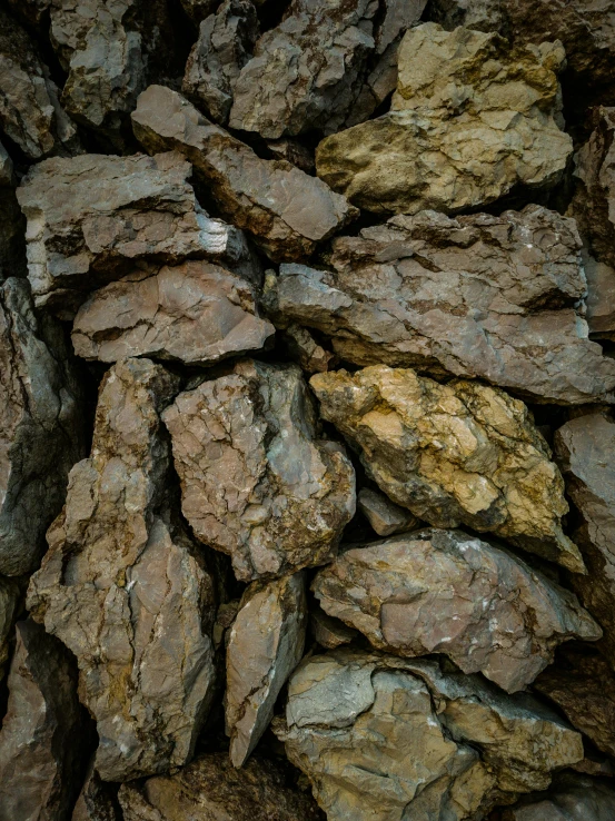 rocks are stacked up together in a rock field