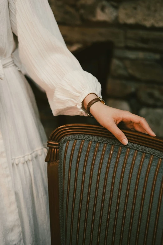a closeup of a woman holding a suitcase