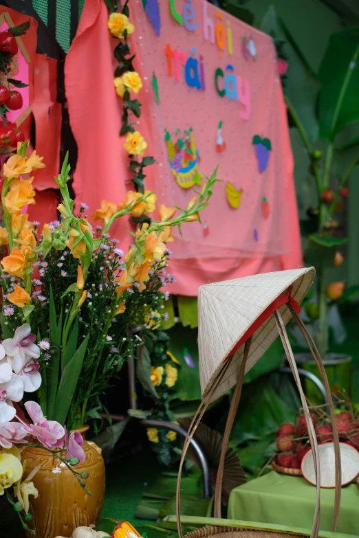 colorful flower display with wooden basket for umbrella