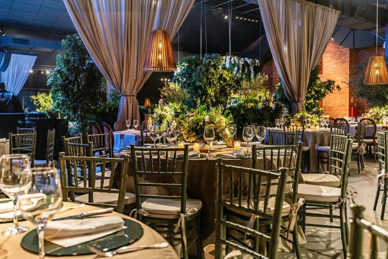 table set up for formal function with vases and glasses