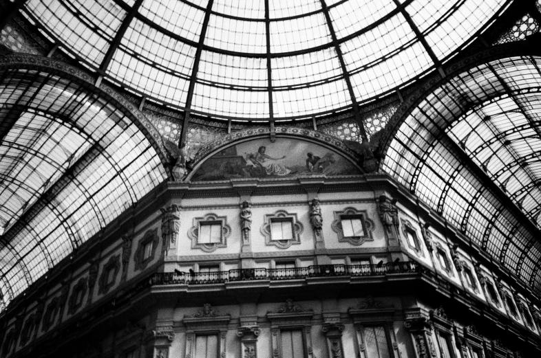 a large dome with glass walls at an indoor area