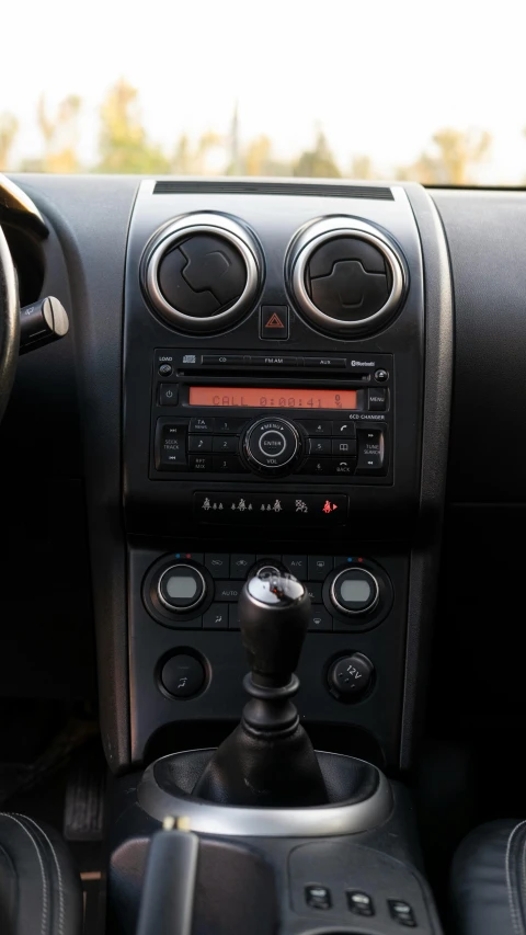 the radio on the dash board of a vehicle
