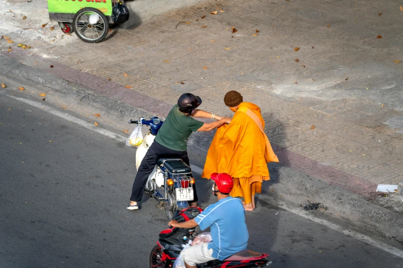 a person riding on the back of a motor bike