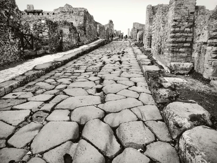 ancient road with stones laid out by the water