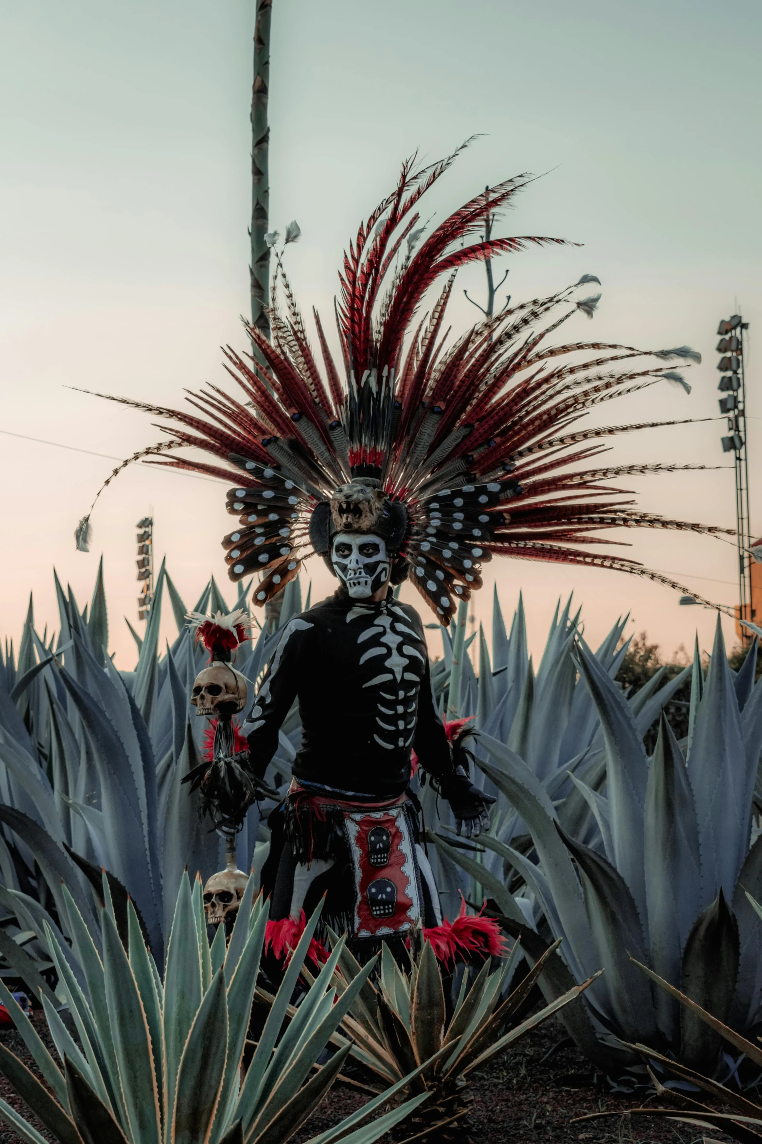 some people wearing costumes and some plants