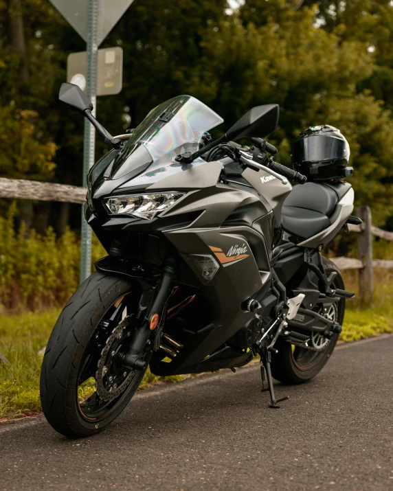 a motorcycle sits parked on the side of a road