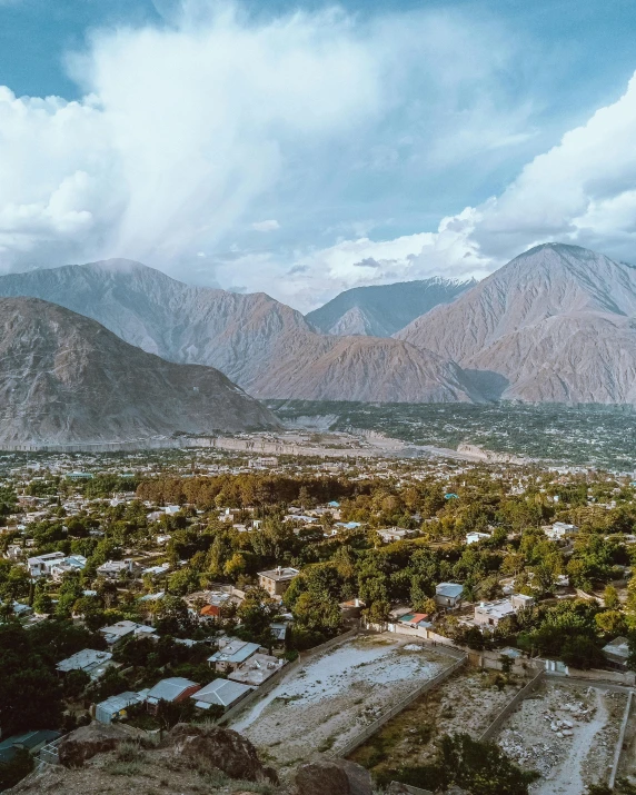 a view of some mountains and land in the distance