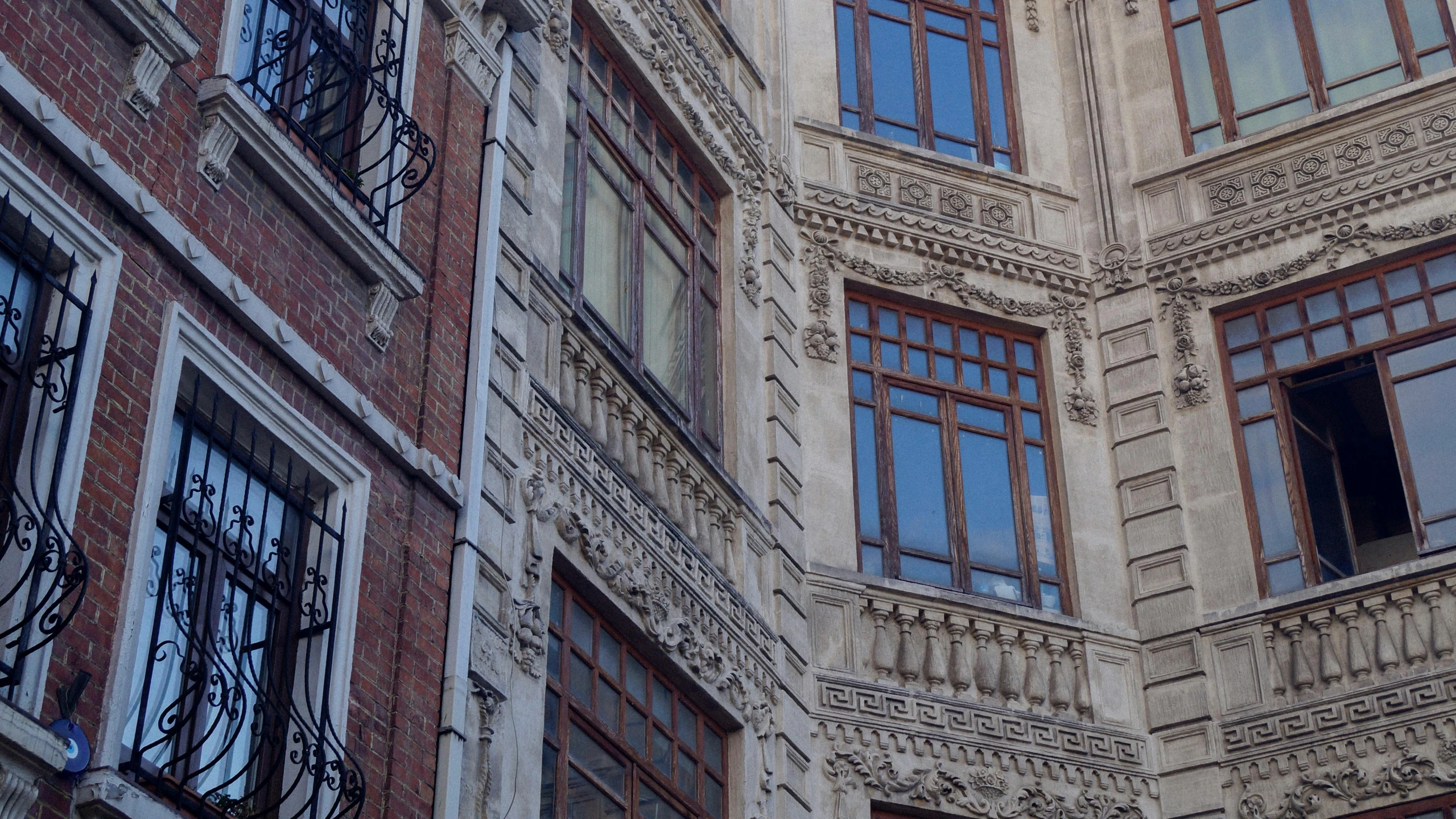 some windows and railings of a building