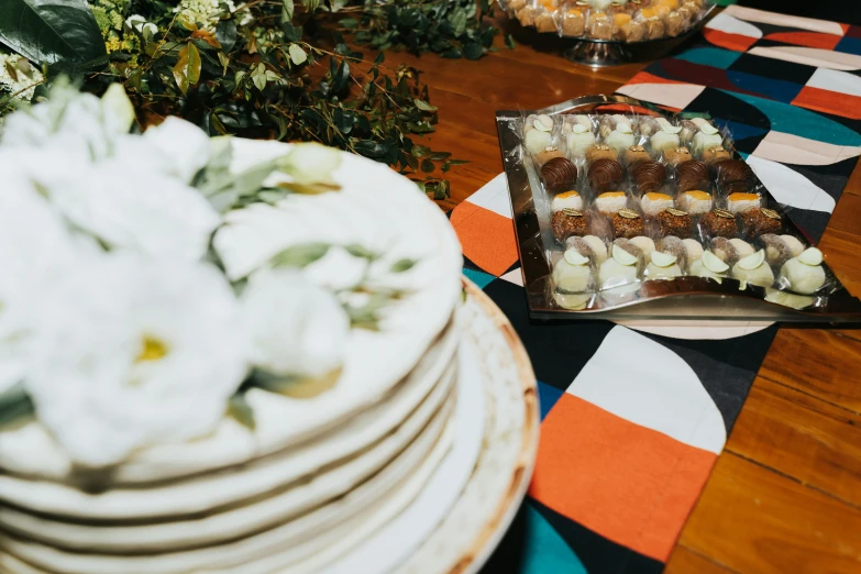 there are many cookies on a glass plate