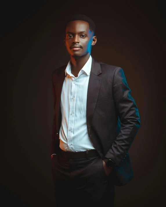 an african american man wearing a suit and tie