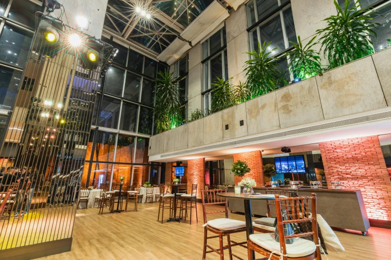 a restaurant has been decorated with wooden floors