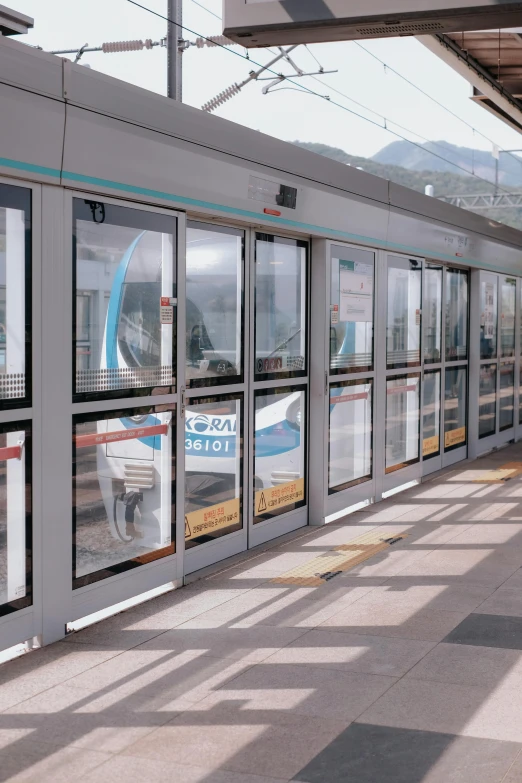 a window sitting next to the side of a train