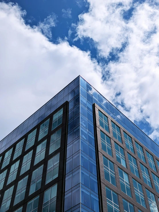 two high rise buildings on a cloudy day