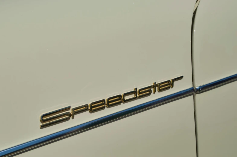 the emblem on the front of a sports car