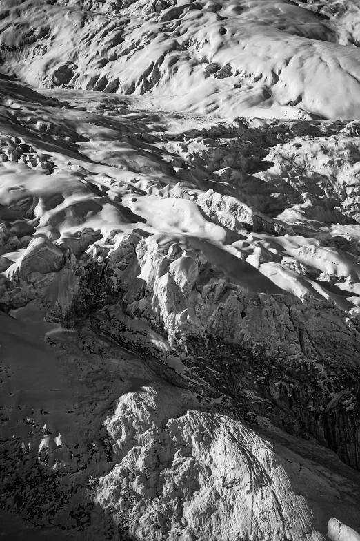 an area with many snow covered mountains and slopes