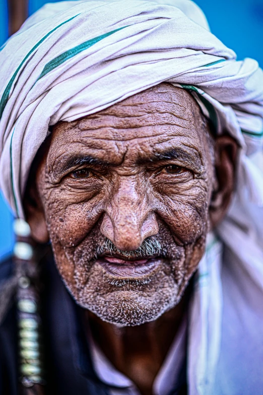 a man with a large turban on his head