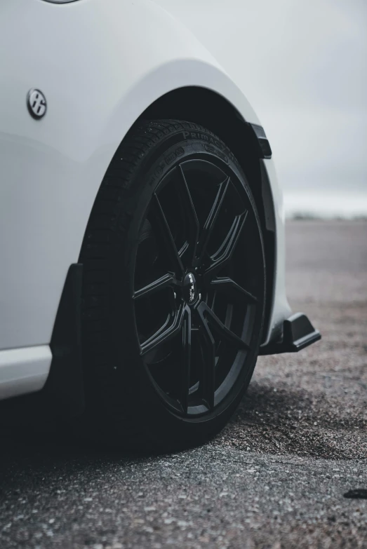 a close up view of the wheels on a car