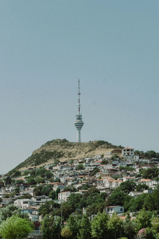 a large white building on top of a hill