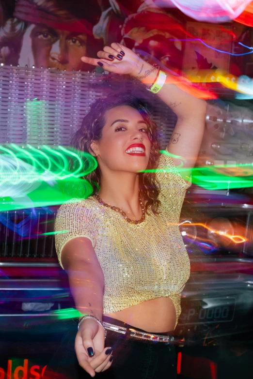 a woman in motion in a disco outfit