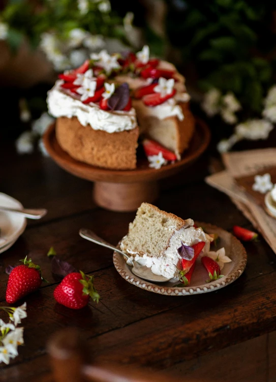 some type of cake with strawberries on the plate