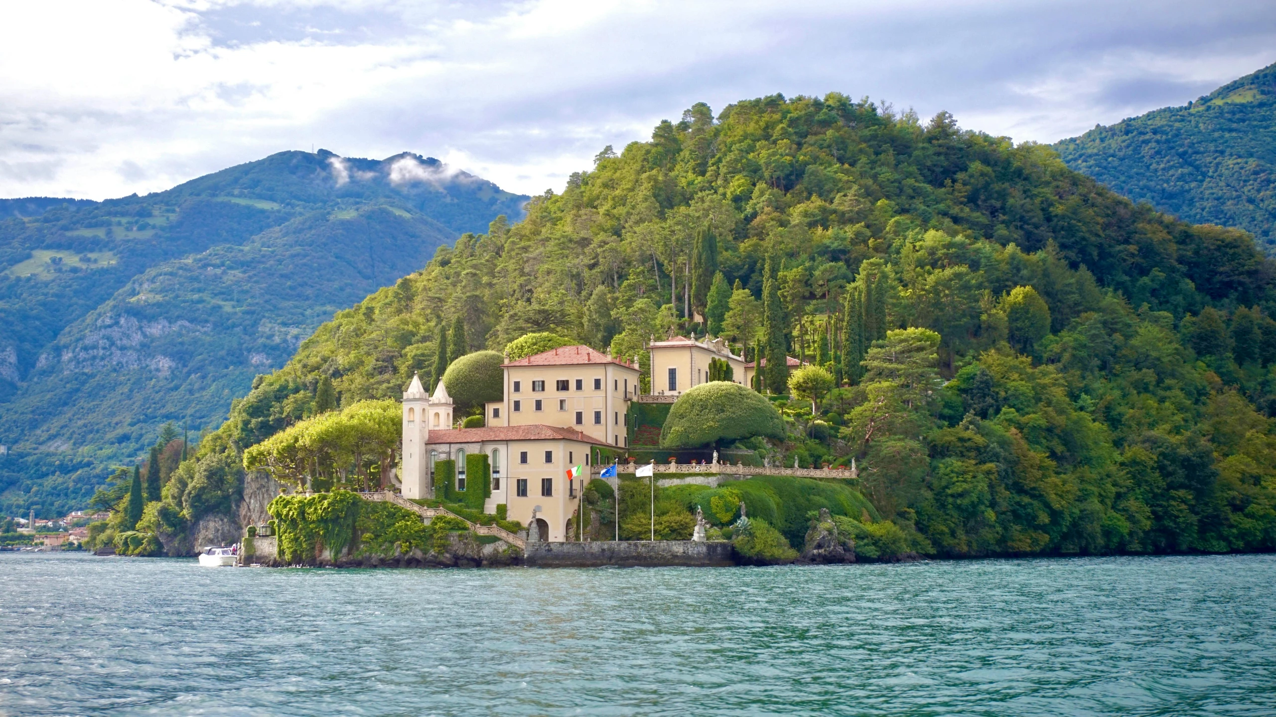 a large house sitting on top of an island