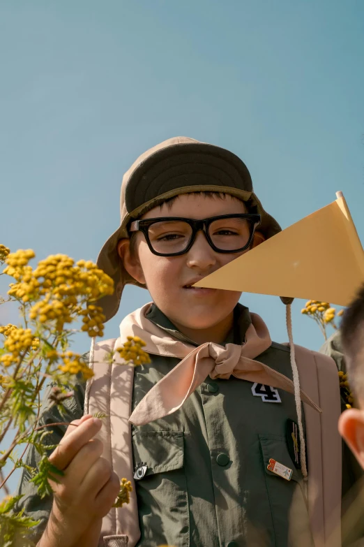 a child with an image of a bird on his head