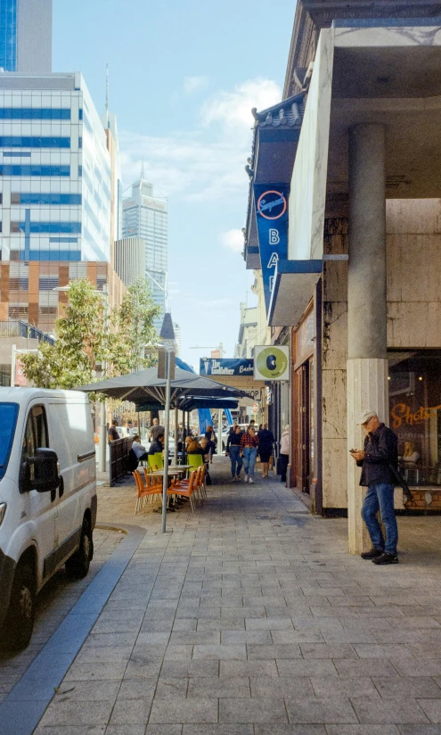 a street scene with a few buildings in the background