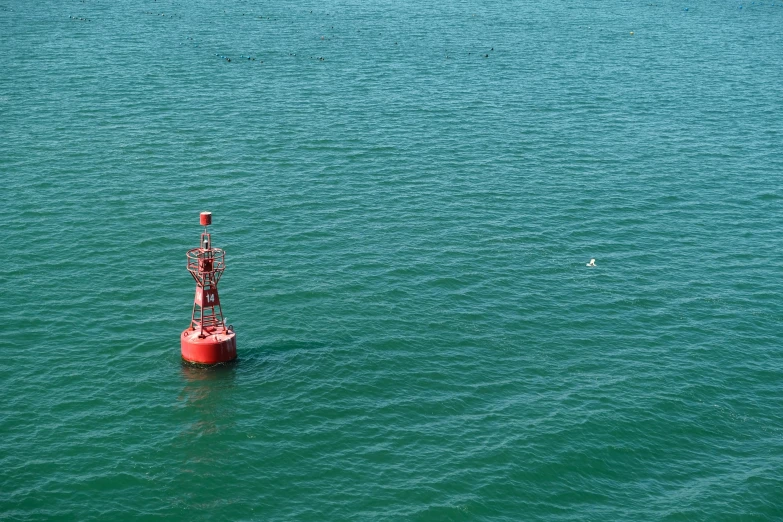 an oil tanker floating in the middle of a lake