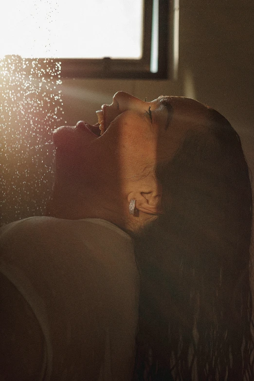 blurry image of a person's head against a window