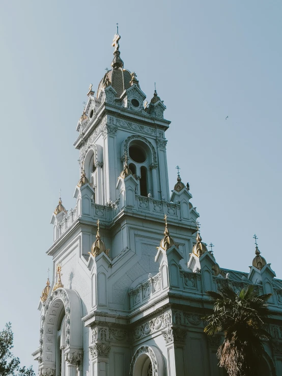 a church with two clocks in the top and one on top