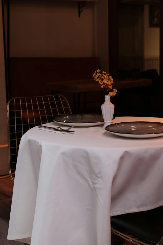 a table with two plates on top of it