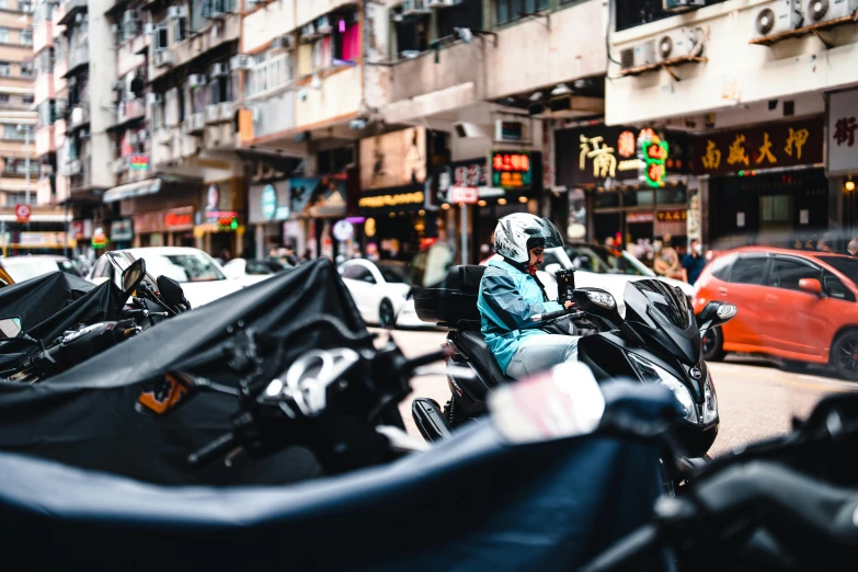 a view of a parking lot with many parked motorcycles