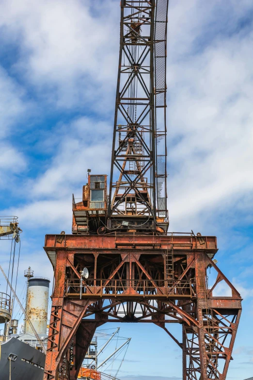 an image of a crane building structure on the ocean