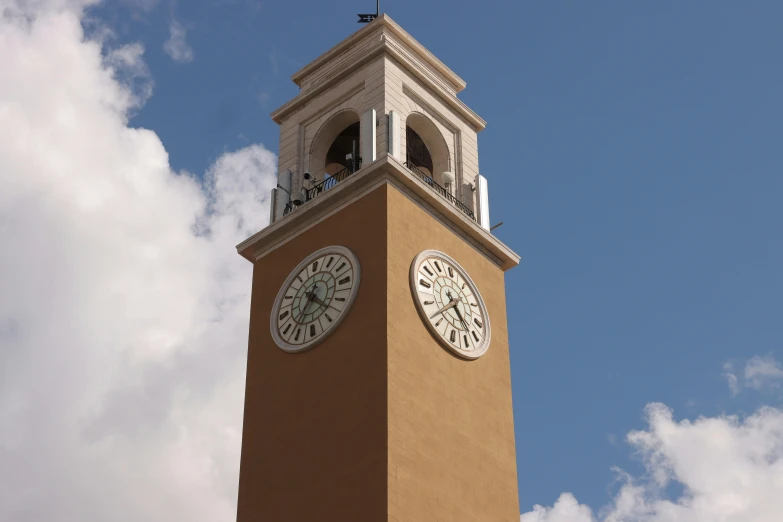 there are two clocks on the side of this tower